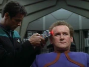 Dr. Julian Bashir performs a physical on Miles O'Brien