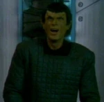 A male Romulan prisoner