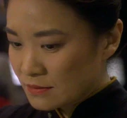 Lily Mariye as the Saratoga 's operations officer.