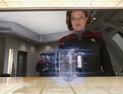 A replicator creates a mug, after the coffee