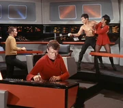 Eddie Paskey (fore, center) as "Ryan" in "The Naked Time"