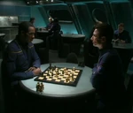 Travis Mayweather and Malcolm Reed play chess