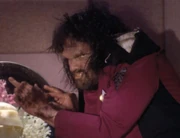 Commander Riker, turned into an australopithecine.