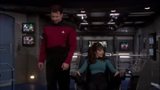 Riker and Troi tour Enterprise's bridge