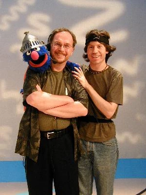 Martin (center) with Super Grover and Eric Jacobson.