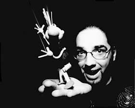 Lagasse and one of his puppet creations