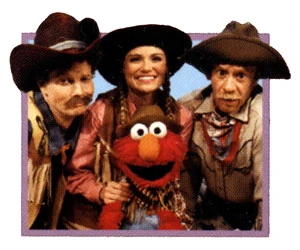 The Noodle Family and Elmo.
