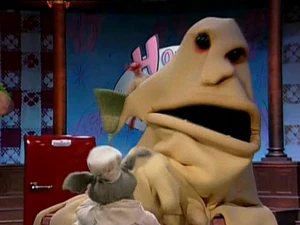 Seymour tries to fight off the Bread Monster