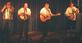 Øyvind Ougaard, Søren Rislund, Jan Monrad and Ole Fick on stage