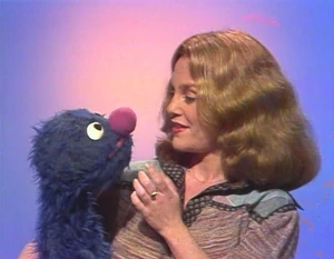 Madeline Kahn, who sings Sing After Me with Grover.