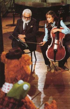Kermit and Fozzie look upon Albert Hague and Lori Singer.