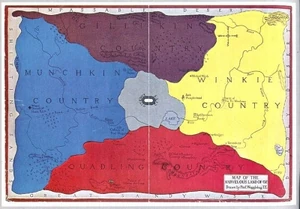 The Land of Oz.  Note that East is to the left, and West to the right, reversed from typical maps and the compass rose as printed here.