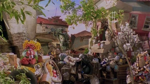 Grizzy sitting in a Grouchland alley
