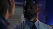 Dr. Scanlan explains Lionel's condition to Lex in Vortex.