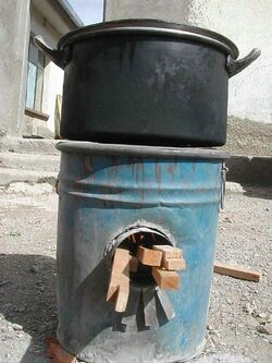 A Rocket stove made from a barrel in Bolivia