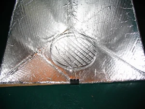 Close-up detail of rack and binder clip.