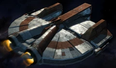 The Ebon Hawk, an armed freighter.