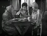 Barbara and Jenny shelter in a hovel