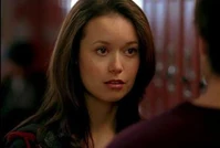 Cameron poses as a student