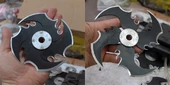 Doesn't look like a CD.  Maybe it's one of those new-fangled Blu-Ray disks?