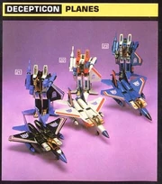 Skywarp is the redeco on the left. He's mostly black... not that this was a cheap or lazy decision.