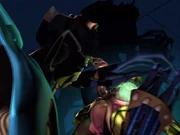 Nightscream's hands don't seem to touch the spark itself while pushing on it.
