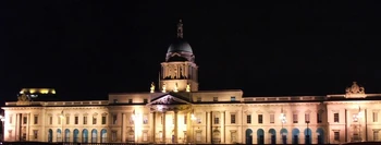 The south facade of the Custom House by night.