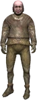 un briquetier couvert de boue