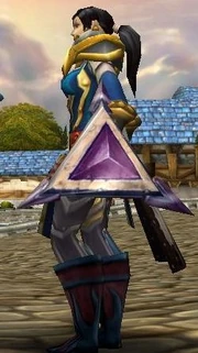 Female human carrying the Earthen Guard