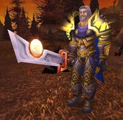 Tirion Fordring wielding Ashbringer, as seen in the WotLK beta