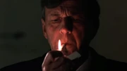 The Cigarette Smoking Man spies on Mulder, Scully and the Lone Gunmen in 1996
