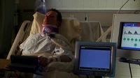 Doggett lies paralyzed in hospital