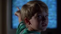 Kevin Moore receiving binary code from the television.