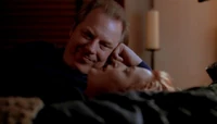 Morris Fletcher (posing as Mulder) attempts to seduce Scully