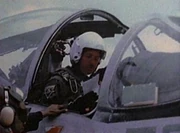 Kersh in the cockpit of a jet.