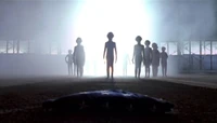 A group of Grey aliens are secretly welcomed to the US